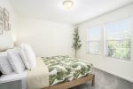 Queen bedroom with a leafy outlook